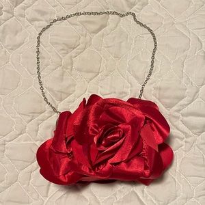 White House Black Market rose evening bag.